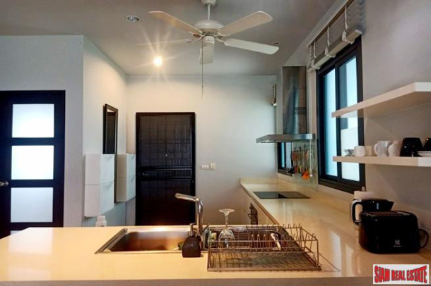 Saiyuan Estate | Nice Two Bedroom Corner Unit with Extra Space and Windows for Sale in Rawai-6