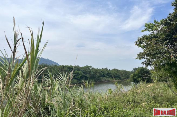 Almost 10 Rai Land Plot with Canal and Mountain Views for Sale in Takua Pa, Phang Nga-9