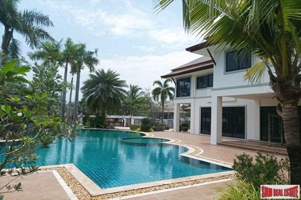 Baan Dusit Pattaya Lake | Beautiful Four Bedroom Pool Villa with Waterfall and Extra for Sale in Na  Jomtien-1