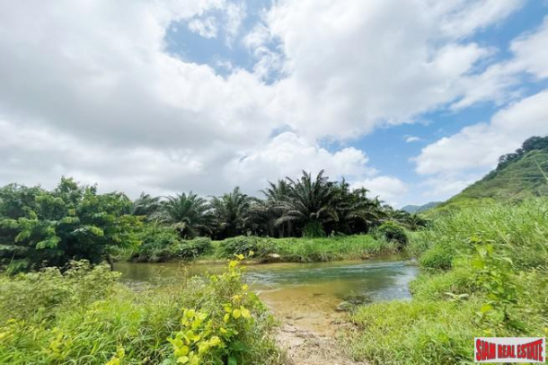 A large plot of 101 rai with clear water stream and mountain view for sale in Khuekkhak, Phangnga-13