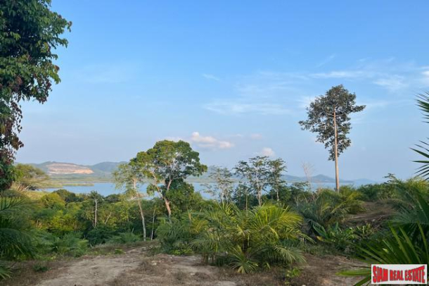 1.5 rai of palm plantation land with a hillside sea view for sale in Takua Thung, Phang Nga.-2